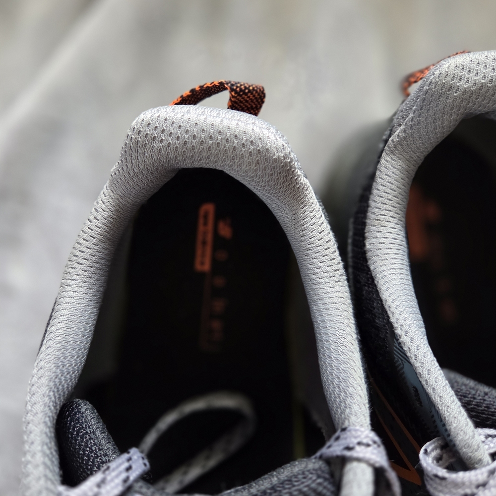 New Balance Men's Athletic Shoes Black with Orange Accents - Picture 2 of 6